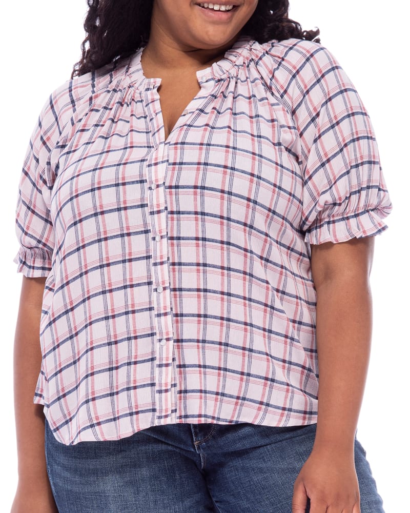 Plus size model wearing Leah Button Down Ruffle Blouse by B Collection By Bobeau | Dia&Co | dia_product_style_image_id:202508
